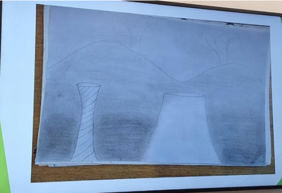 Fig. 1: Fieldwork photo: Drawing by an elementary school student at the fine arts class in Plejvlja, Montenegro, on the topic of what they disliked about their city, 2022